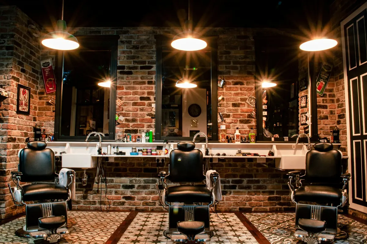 Cinematic scroll style demo — dark storefront interior with warm lighting